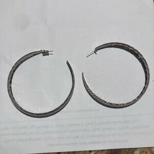 Costume silver tone loop earrings